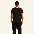 Man wearing the Slumber Cloud Essential V-Neck made with Outlast temperature regulation technology