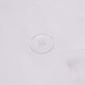 Detailed view of the button on the Slumber Cloud Performance Duvet Cover with temperature regulation technology and Tencel.